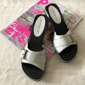White w/ black stitched silver buckle slides